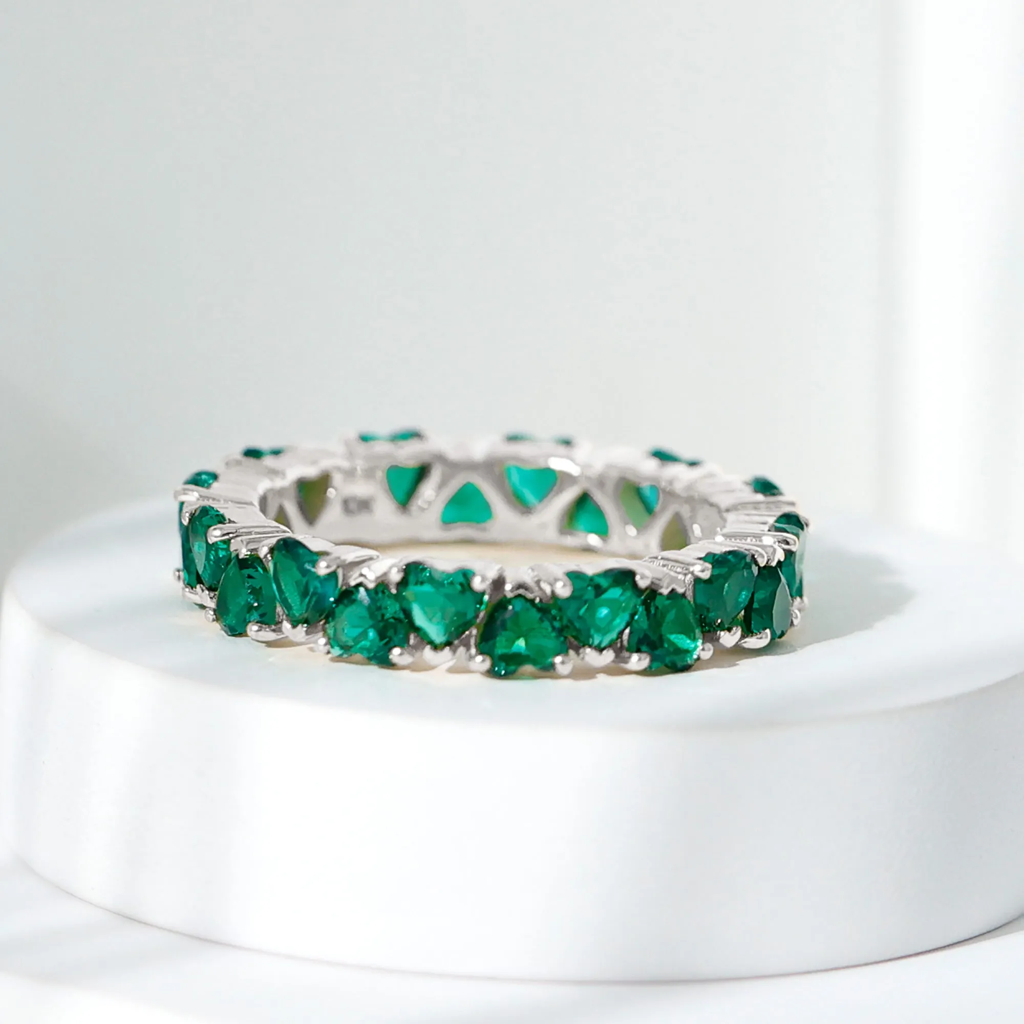 Claw Set Lab-Created Emerald Heart Eternity Band Ring in Gold