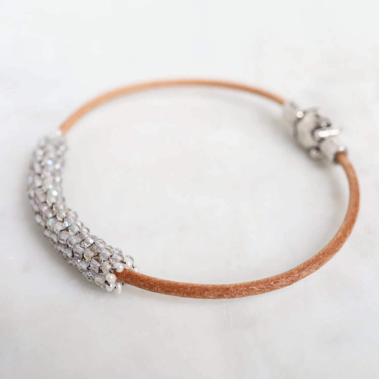 Hand Stitched Sparkly Topaz with Tiny White Pearl Trim on Natural Leather Bracelet