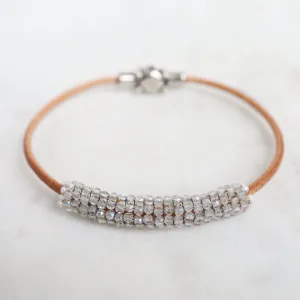 Hand Stitched Sparkly Topaz with Tiny White Pearl Trim on Natural Leather Bracelet