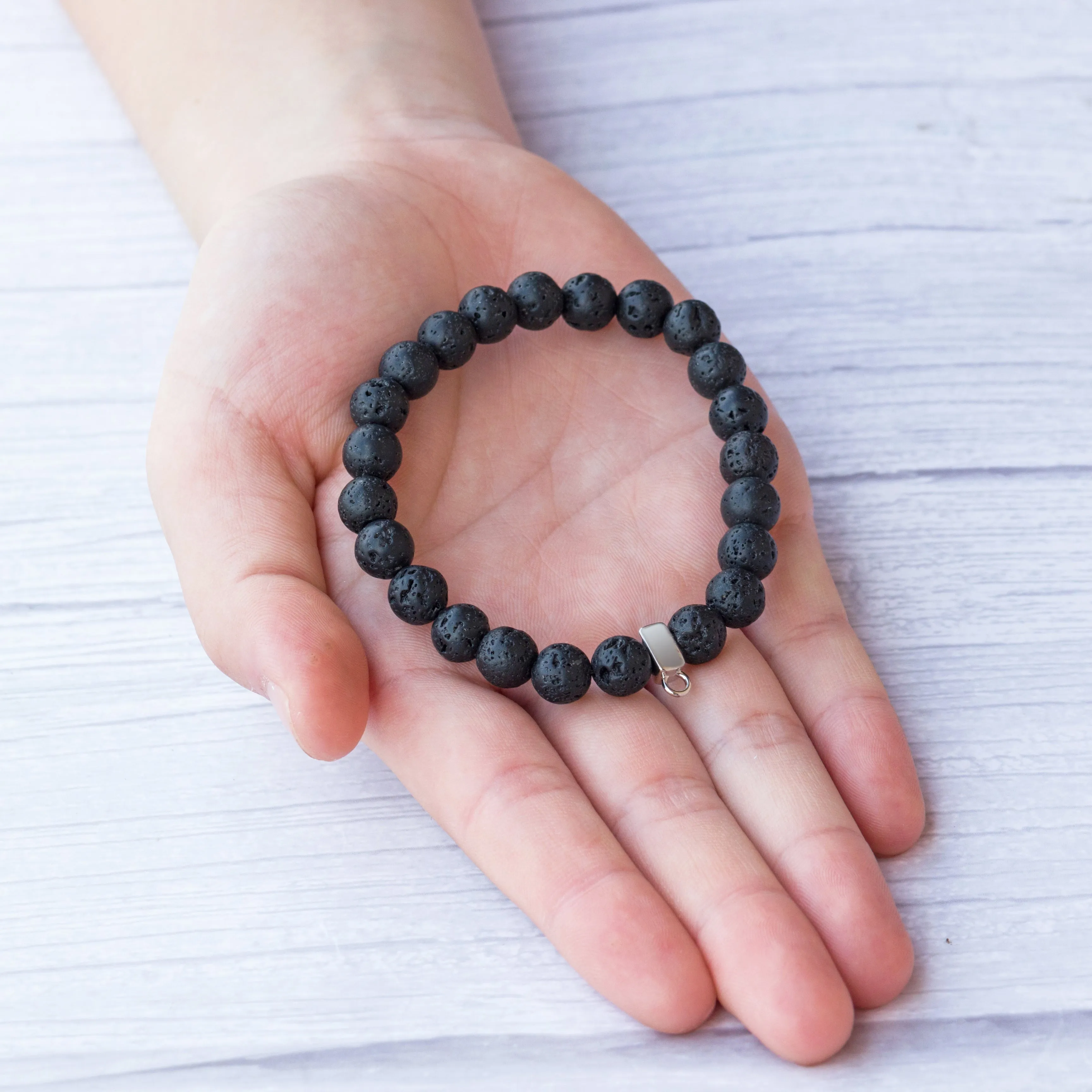 Lava Rock Gemstone Stretch Bracelet with Charm Created with Zircondia® Crystals