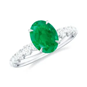 Oval shape Emerald Solitaire Engagement Ring with Diamond Side Stones