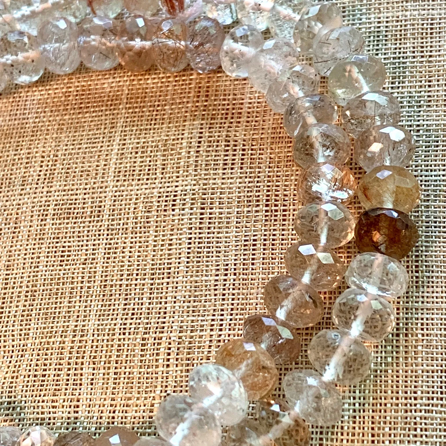 Strand of Faceted Rutilated Quartz Rondelles