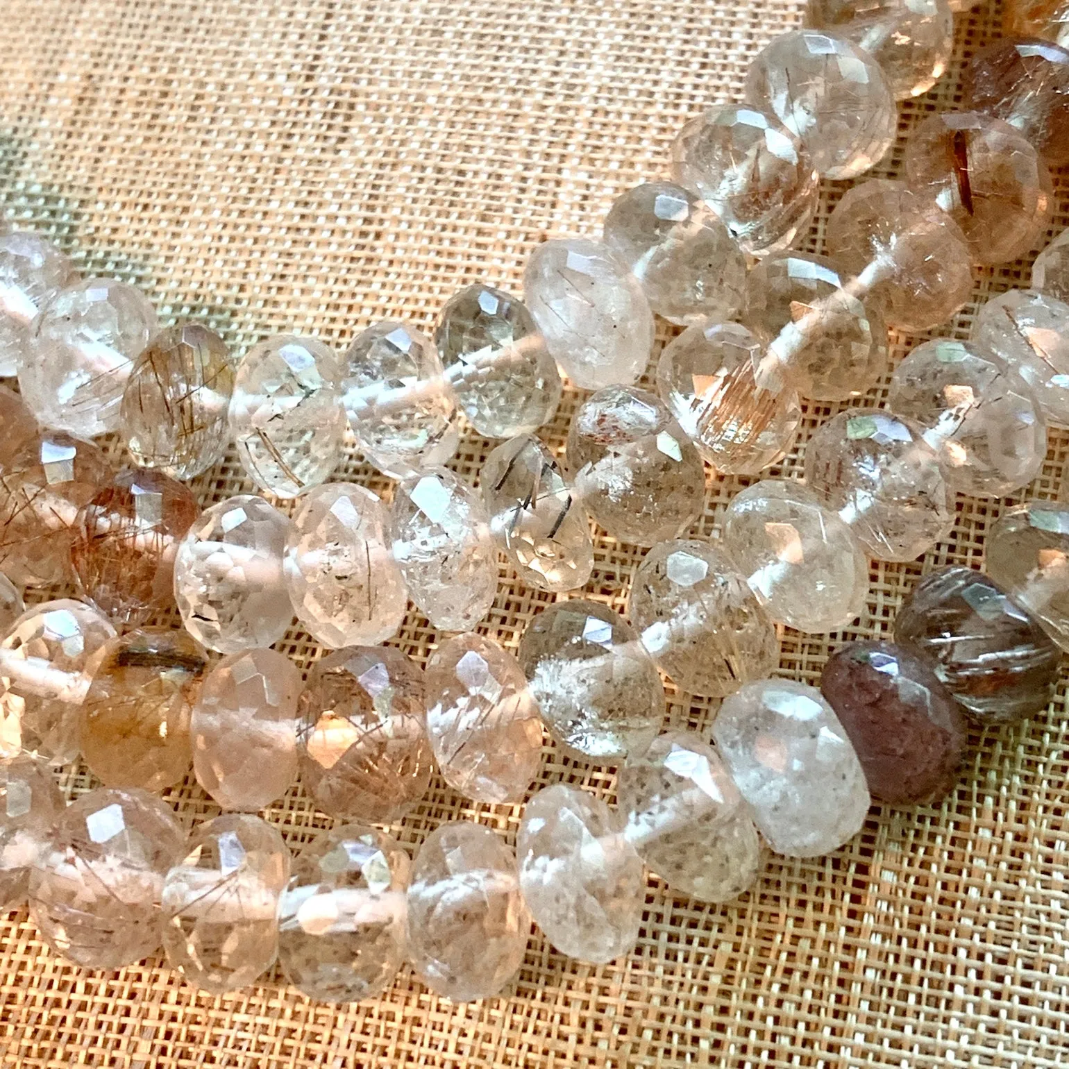 Strand of Faceted Rutilated Quartz Rondelles